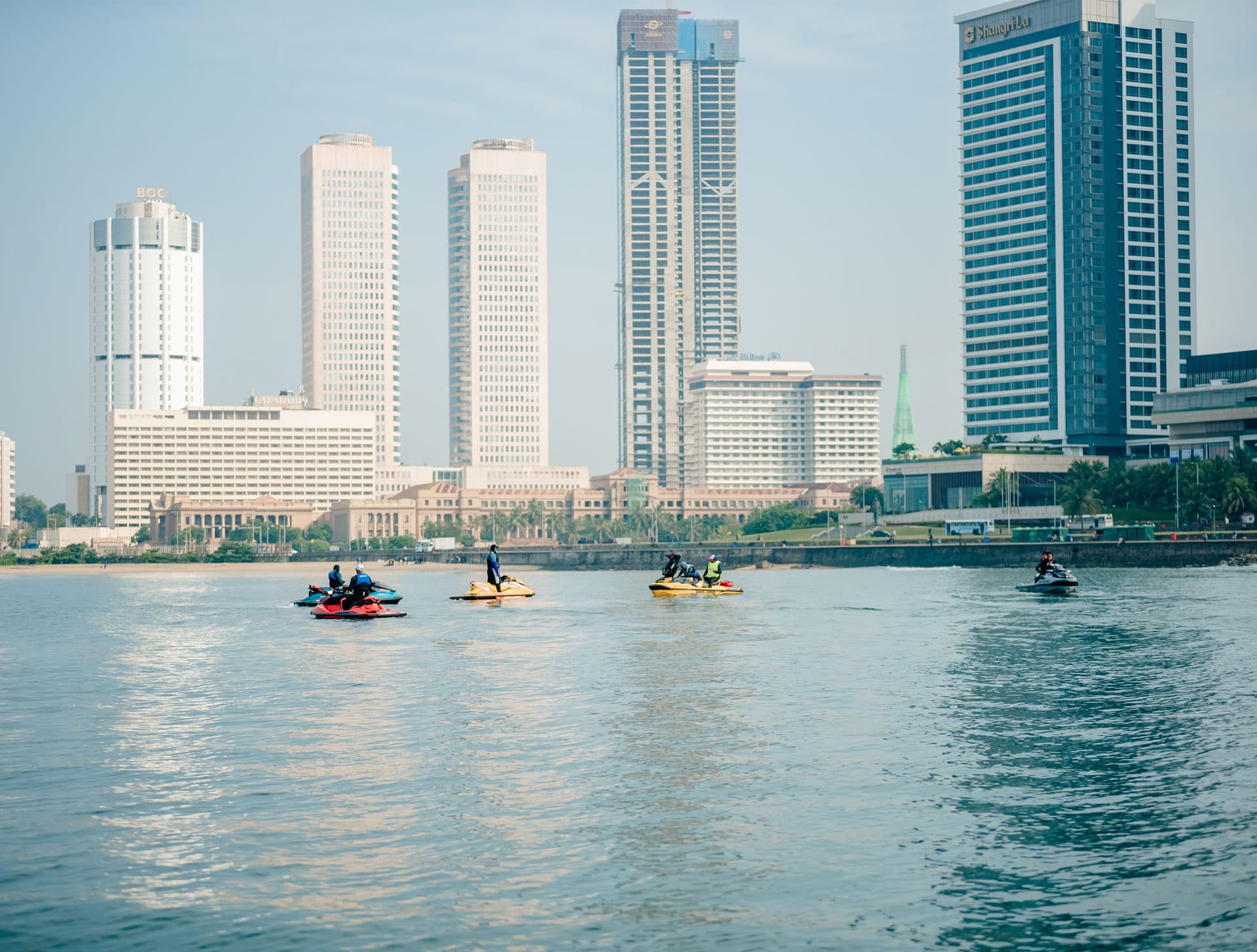 People on Jetskis exploring around Colombo fort city