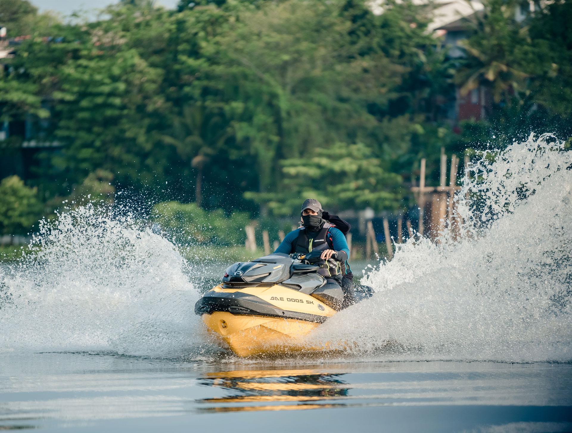 a person riding a jetski in Kalu ganga